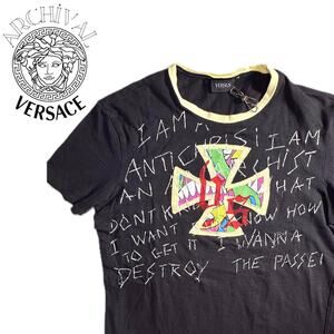 Vtg Versace black and tan short sleeve w/ hand stitched white lettering - Size S